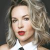 Briana Buckmaster as Anchor Woman