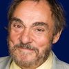 John Rhys-Davies as Chris Tucker