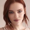Madeline Brewer as Lily