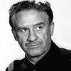 Frank Wilcox as Mr. Meaker, the Bank Manager