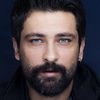Onur Tuna as Atil