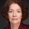 Carmen Roman as Smug Professor