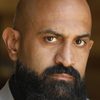 Mike Eshaq as Arab Client