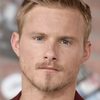 Alexander Ludwig as Emmett Sunday