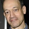 Ted Raimi as Scared Onlooker (uncredited)