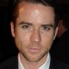 Christian Campbell as Eric Garrett