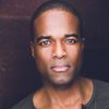 Derrick Davis as M.C.