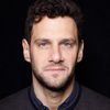 Justin Bartha as Simon Keeley