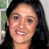 Sujata Kumar as Mrs. Haqq