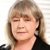 Noni Hazlehurst as The Stranger