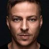 Tom Wlaschiha as Gerhardt Neddermayer