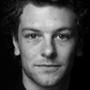 Dan Spielman as Simon