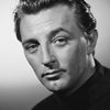 Robert Mitchum as Peter Hacker