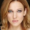 Kate Beahan as Coat Check Girl