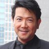 Tetsuya Bessho as Uncle Akio