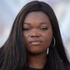 Guslagie Malanda as Laurence Coly