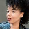 Christina Childress as Justine's Hostess