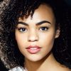 Ella Martine as Naomi