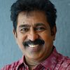 Prem Kumar as Karaikoothan