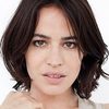 Giorgia Sinicorni as Amante di Carlo