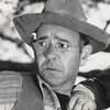 Milburn Morante as Groceryman(uncredited)