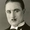 Syd Chaplin as Charlie's Friend and Lunch Cart Owner