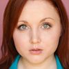 Jessie Holder Tourtellotte as Anchorwoman