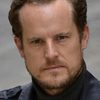 Tim Daish as Prof. John Martin