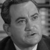Wendell Holmes as Rev. Ulrich