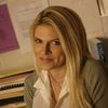 Sazzy Lee Calhoun as Purser