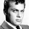 Tony Curtis as Dominic