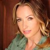 Krista Bell as Roman's Mom
