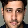 Damien Strouthos as Nightclub Comedian