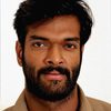 Charandeep as Puliyampatti Tigers Wrestler