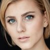 Olivia Peck as Iris