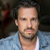 Robert Jozinovic as Man in Office