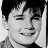 Bryan Russell as The Little Boy (uncredited)