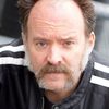Joe Cassidy as Worker