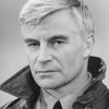 John Castle as Neville St. Claire