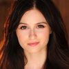 Melanie Papalia as Ellie