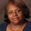 Maxine Barnett as Mama Cynthia