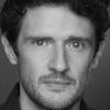 Edward Harrison as John Gates