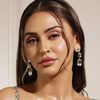 Krystle D'Souza as Mrs. Natasha Oswal