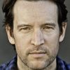 John Pollono as Frank Romanowski
