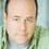 Michael Dempsey as Village Santa