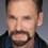 Mike Watkiss as Angelo