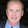 John O'Brien as Man in Suit