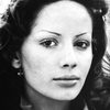Patrizia Basso as Romana Taberi