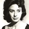 Joan Harvey as Dina Paris