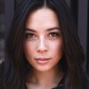 Malese Jow as Julie